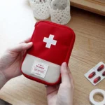 kf-Ha6ea962e858b41bd9a7f7c068753ff7ab-Cute-Mini-Portable-Medicine-Bag-First-Aid-Kit-Medical-Emergency-Kits-Organizer-Outdoor-Household-Medicine-Pill
