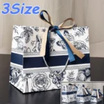 kf-S7c0ded57d69f41918c91a6bfbde877fa3-New-Gift-Bags-Floral-Paper-Bags-Cross-Border-Packaging-Bags-With-Ribbon-Holiday-Gift-Giving-Gift