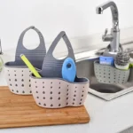 kf-Sbf674464db3942cc9fb78cf72ceeda8dM-1PC-Kitchen-Organizer-Adjustable-Snap-Sink-Sponge-Holder-Kitchen-Hanging-Drain-Basket-Kitchen-Gadgets