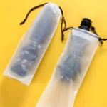 kf-Sf36c0670f4f5414aa9cd3ce3cfae47530-Plastic-Bag-Matte-Translucent-Umbrella-Storage-Bag-Reusable-Portable-Umbrella-Drawstring-Storage-Cover