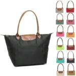 kf-Sc961f66b543c4cbdbcce70a6e3fdeec74-Classic-Foldable-Dumpling-Bun-Bag-Waterproof-Nylon-Embroidered-Dumpling-Bag-Fashion-Shoulder-Bag-Handbag-Mommy-Tote