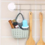 kf-Sf7cef2218198403a8a63994a4ce6b9f4Z-Sink-Draining-Hanging-Basket-Adjustable-Kitchen-Accessories-Rubber-Sink-Bag-Soap-Sponge-Shelf-Faucet-Holder-for