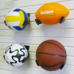 kf-Hf5b34450dae4439aaa503eec511c35cbl-2021-New-Plastic-Ball-Claw-Wall-Mount-Basketball-Holder-Football-Storage-Rack-Ball-Display-Bracket-Space