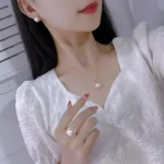 kf-S515fc2513ee64f37b0c0a410e33a7040l-New-Inlaid-zircon-Pearl-Necklace-Ring-Earrings-Three-piece-Set-for-Women-Stylish-Daily-Accessories-Party