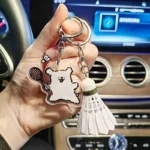 kf-Sb7f83c52487a4a7ab046a1eb3b089fe4E-YONEX-Cartoon-Badminton-Bag-Keychain-Fashionable-Cute-Tennis-Racket-Backpack-Keychain-Acrylic-Pendant-Couple-s-Gift