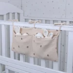 kf-S03b5219b73f54b3f9f0638d98924e4fb5-1pc-Portable-Baby-Crib-Storage-Bag-Multifunctional-Newborn-Bed-Headboard-Organizer-For-Kids-Baby-Bedding-Diaper